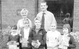 Cathy Aughey (Head of Friends Prep School) with Andrew Clements (Manager, JC Patterson, Lisburn) at the recent One Life Award ceremony for the One Life Art Project. In the centre is winner Jamie Cochrane. US28-710SP.