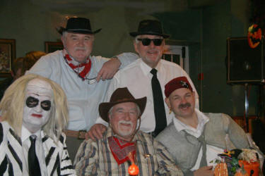 Bakerloo Junction�s Noel McMaster (Blues Brother) is pictured with Oklahoma�s Howard Keel (left) and L to R: (front) Beetlejuice, Cowboy Nelson and Pirate Pete. 