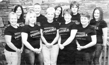 Ballymacash Primary School staff with Paul and Fiona Coles. (L-R) Esther Owens, Patricia Evans Paul Coles, Fiona Coles, Lisa Dunsmore and Joanna Hawe