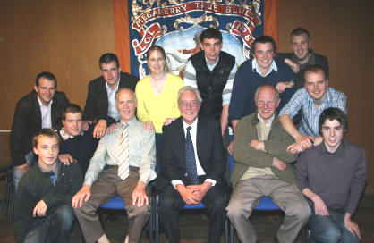 L to R: (seated) Roy Wilson (Secretary), Alwyn Totten (Conductor) and Sandy Wilson (Chairman) pictured with members of the Roses Lane Ends Flute Band (back row) who enjoyed a great evening of entertainment at the band�s centenary concert in Maghaberry Orange Hall last Friday evening (19th September). 