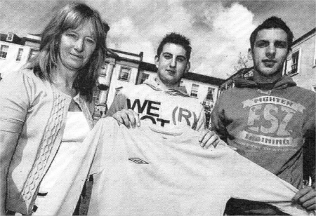 Ellen Hillen Lisburn Square Manager presents Nathan and Chris McCluskey with the football kit. US2708-101A0 Picture By: Aidan O'Reilly