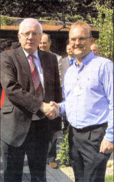 Morris Maxwell, winner of the Best Planting Award at last weekend's Gardenshow Irelandreceives his prize from Councillor Allan Ewart. Mr. Maxwell also received a gold award.