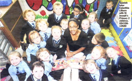 Spanish tutor Calanthia Lilburn with St Joseph's Primary 2 children. US4108- 126A0