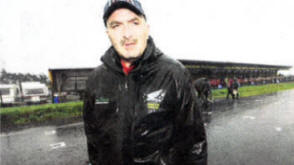 Clerk of the Course Noel Johnston stands on the deserted race grid at Dundrod.