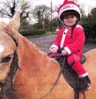 Chloe Agnew (3) from Lisburn on her pony Lollipop