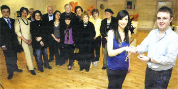 At the Island Arts Centre is Claire McAlister being congratulated by Lisburn Arts Advisory Committee and its Chairman Richard Yarr US1109-403PM Pic by Paul Murphy