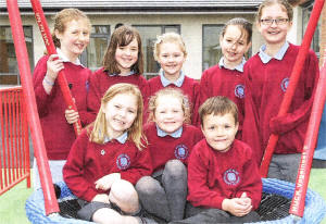 Children enjoying the play park at the new Pond Park Primary School. US1709-527cCD