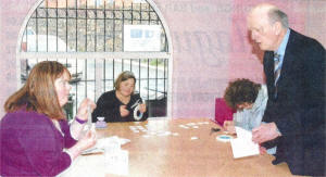 Health Minister Michael McGimpsey pictured with staff at Pink Elephant Cards, Stepping Stones.