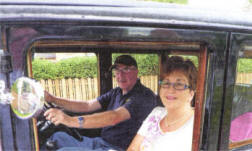 Secretary of the club Ella McLouchlin from Lisburn is chauffeured by Des Ballantine in his 1929 Austin 16/6.