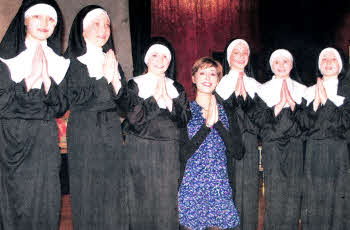 Connie with the nuns during her recent visit to Friends' Prep.
			