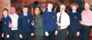 At the presentation of President's Badges during the 'Service of Thanksgiving' are L to R: Robbie and Euan McConaghie, Lewis and John Nesbitt, David and Keith Bailie and Ben and Paul Conn. 