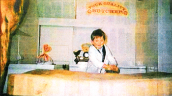 Andrew at his father's butcher's shop in Bridge Street before the family emigrated.