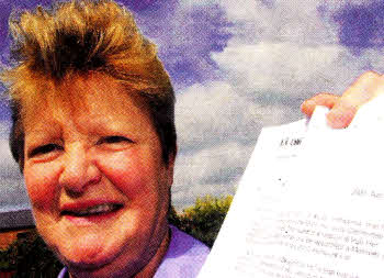 Anne Thompson with the letter she received confirming she has been awarded the MBE
	