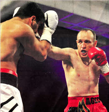 On the ropes....Lisburn boxer Brian Magee has Armenian fighter Roman Aramian on the ropes in the successful defence of his European Super-Middleweight title in Dublin.