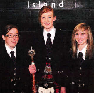 L to R: Piper Roberta Nolan, Drum Major Lauren Hanna and Tenor Drummer Nicole McMullan at the reception.