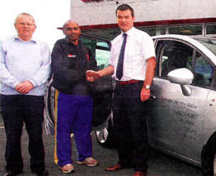 Lisburn Cricket Club Chairman Ian Ross, Yasas Tillakaratne (Lisburn cricket club professional) and James Clarke Sales Executive Charles Hurst Lisburn who are sponsoring Lisburn Cricket Club- US341O-106A0