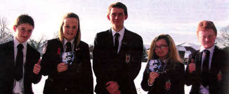 Mark Wells with Pupils from Year 9 at his recent Album Launch at Wallace High School. The launch was organised by the Year 13 Young Enterprise.