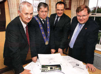 Developer Ken Cleland, Lisburn Deputy Mayor Brian Heading, Tourist Board Chairman Howard Hastings and Jonathan Craig MLA reviewing plans for the new hotel in Lisburn. US4510.530cd