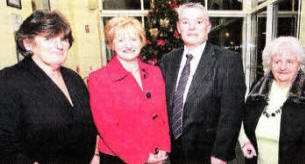 Carol McBurney, diversional therapist; Edna Elliott, ward manager; Gordon Moore, disability manager; and Marie McStay, volunteer, attending an evening at Thompson House Hospital to mark the 125th anniversary. US4910-525cd