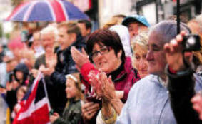 Applause for the Royal Irish Regiment as the parade through Lisburn gets underway. US2111-577cd