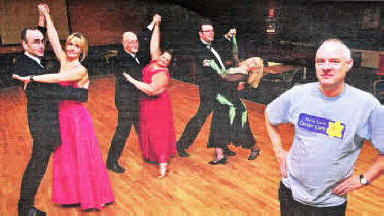 Phil Kane of Marie Curie Cancer Care with dancers who will be taking part in a 1940's dance evening in aid of the charity at the Royal British Legion Lisburn US0511-401PM Pic by Paul Murphy