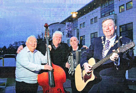 Barnbrack's Back! Mayor Paul Porter helps Barnbrack get ready to hit the stage for a special one-off reunion concert on St. Patrick's Day at Lagan Valley Island, Lisburn.The concert will be their first since 2003 and all proceeds will go to the Mayor's chosen charity 'Carers Forum on Learning Disability'