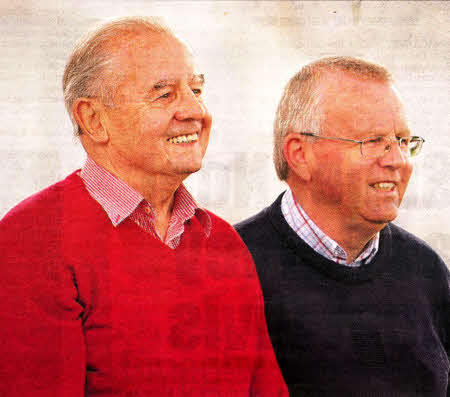 It was cricket as usual for Cecil Walker last Saturday as he watched Lisburn beat Carrick- Earlier in the day news for broke of his MBE award in the Queen's Birthday Honours List- He is pictured with club chairman Ian Ross- US2411- 523cd