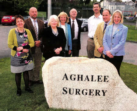 Dr. June Wilson, Dr. Alan Bell, Evelyn Best, Nichola Hynes, Professor Gordon Best, Dr. Henry O'Frlel, Lindsay Best and Julie Jordan at Aghalee surgery. US1611-105A0