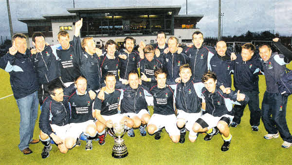 Lisnagarvey players celebrate their Kirk Cup final victory over Cookstown at Comber Road. US5211-516cd Picture: Cliff Donaldson