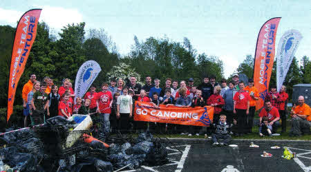 Representatives from Lagan Valley Regional Park, Scouts NI, Mobile Team Adventure and Lisburn City Council welcome ashore the hard working river cleaners at the Lagan Valiey Island on the banks of the Lagan.