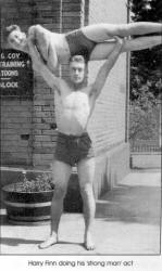 Harry finn doing his 'strong man'act